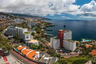 an aerial view of a city and the ocean at Apartamento do Mar II by An Island Apart in Funchal