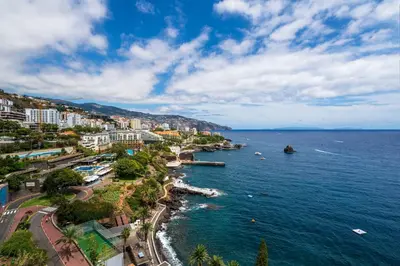 an aerial view of a city and the ocean at Apartamento do Mar II by An Island Apart in Funchal