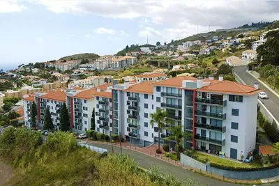 an aerial view of a city with apartment buildings at Sunrise Apartment in Caniço
