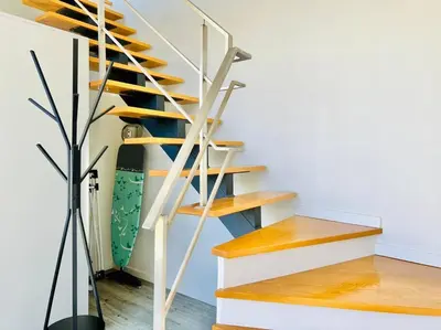 a staircase in a house with a skateboard on it at Haus am Meer by Your Madeira Rentals in Paul do Mar