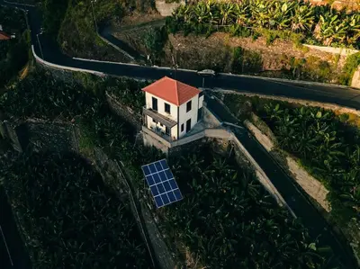 an aerial view of a house with a solar panel at Paradise Santo Amaro in Ponta do Sol