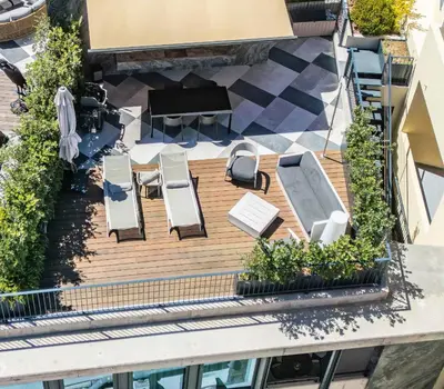an overhead view of a deck with chairs and a pool at Exclusive Terrace Apartment at Savoy Insular in Funchal