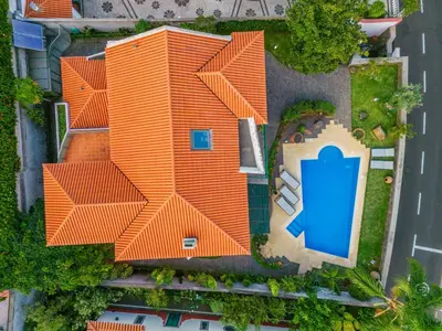 an overhead view of a house with an orange roof at Villa Magnólia in Funchal