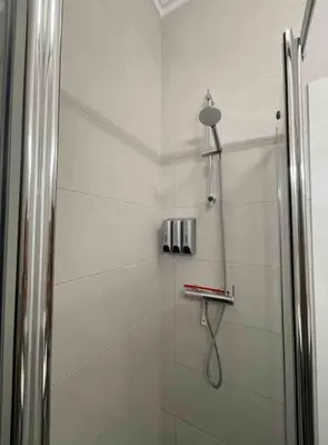 a shower with a glass door in a bathroom at Cantinho de Sagres in Sagres