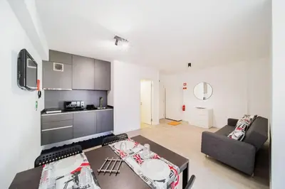 a living room with a couch and a table at JMF Flats in Funchal