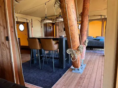 an interior view of a kitchen and bar in an rv at Quinta Aurora in Burgau