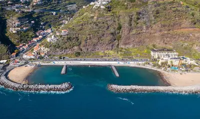 an aerial view of a beach with a bridge at Isabel Apartment by Holiday Rental Madeira in Ribeira Brava