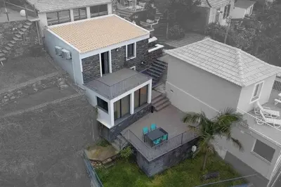 an overhead view of a white house with a porch at Lombo do Doutor Cottage 2 by Mth in Calheta