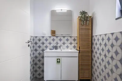 a bathroom with a sink and a mirror at Casa Jose Antonio B by Homie in Gaula