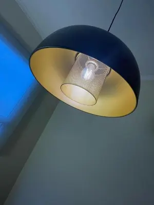 a ceiling light hanging from a ceiling at Wanderlust House in Ponta Delgada
