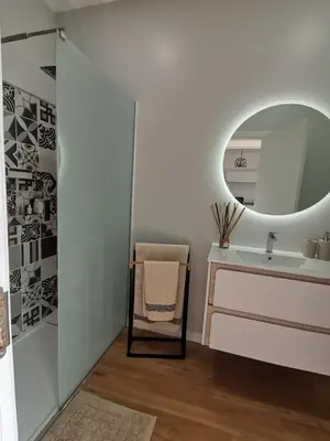 a bathroom with a sink and a mirror at Mazelia's House in Gaula
