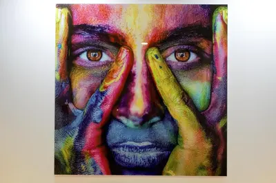 a painting of a woman with her hands on her face at Mazelia's House in Gaula