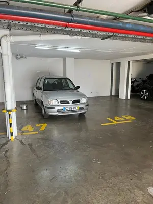 a silver car parked in a parking garage at GuestReady - Tranquil Nest in Funchal in Funchal