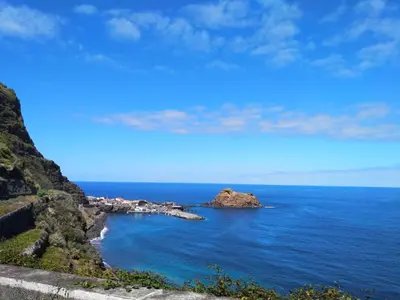 an island in the middle of the ocean at Fisherman's house in Porto Moniz