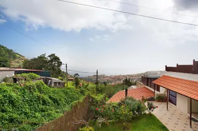 a view of a house with a yard at Casa Conny in Caniço