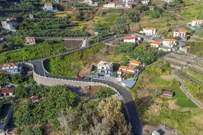 an aerial view of a winding road in a village at Yuri Big House in Ribeira Brava
