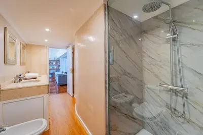 a bathroom with a shower and a sink at Ana's Place in Funchal