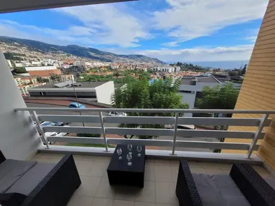 a balcony with a view of a city at Pilar Balconies in Funchal City in Funchal