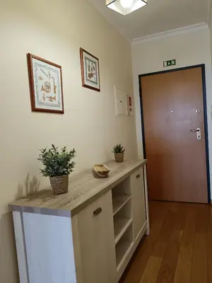 a room with a counter with a door and a hallway at Casa da Vila in Santa Cruz
