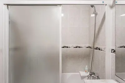 a bathroom with a shower and a sink at GuestReady - A brilliant stay near the sea in Funchal