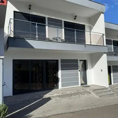 E - Elegant Terraced Home with FREE Private Parking