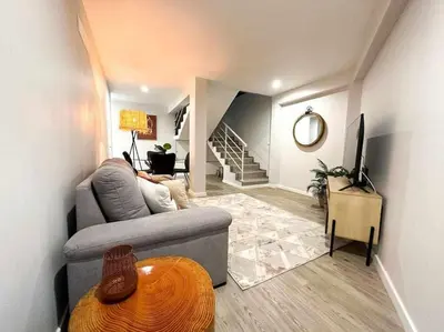 a living room with a couch and a table at Pena Apartments - A by MTH in Funchal