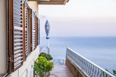 a balcony with a view of the ocean at White Rabbit II by Homie in Calheta