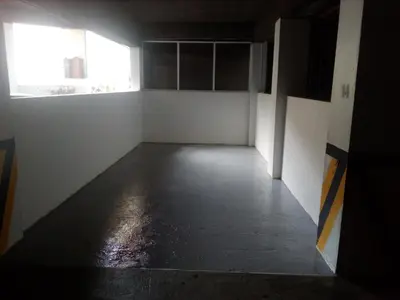 an empty room with a large window and a floor at Apartment - The Historical Center of Funchal in Alojamento Local in Funchal