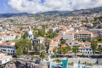 an aerial view of a city with buildings at Apartment - The Historical Center of Funchal in Alojamento Local in Funchal