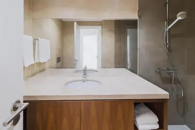 a bathroom with a sink and a shower at Villa Blue Sagres D in Sagres