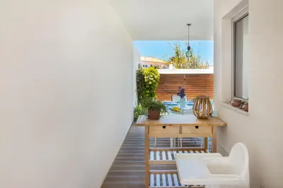 a room with a table and chairs in a house at Villa Blue Sagres D in Sagres