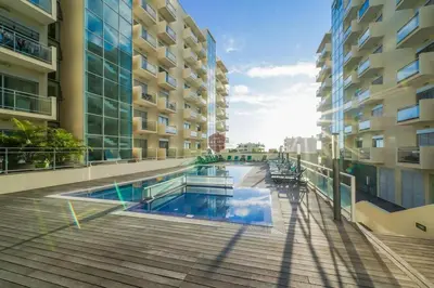 a swimming pool in the middle of a building at Vista Mar Concórdia by Rentallido in Funchal