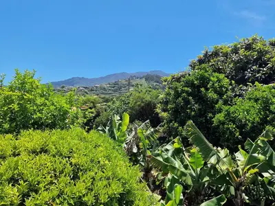 a balcony with a table and chairs and a view at Villa Alta Vista in São Jorge