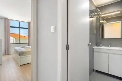 a bathroom with a sink and a shower at Refúgio Na Cidade 104 in Funchal