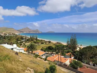 a view of a beach and the ocean at Porto Santo Happy Place in Porto Santo