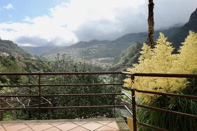 a balcony with a view of a valley at Quinta dos Cardais by AnaLodges in São Vicente
