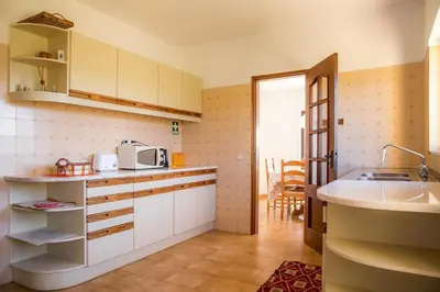 a kitchen with a sink and a counter top at D05 - Amadeus Sunset Villa in Mato Porcas