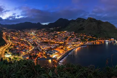 an aerial view of a city at night at Machico center w/ terrace 5 min beach in Machico