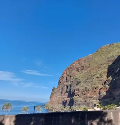 a view of the ocean and a mountain at Barbara Home in Madalena do Mar