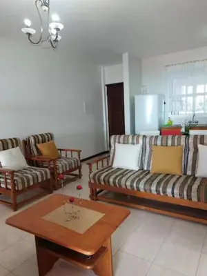 a living room with two couches and a coffee table at Barbara Home in Madalena do Mar