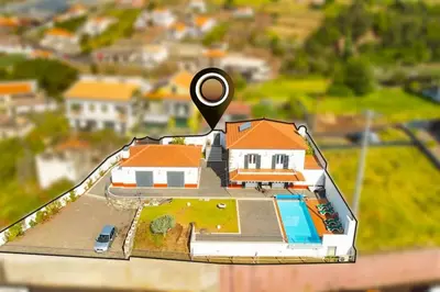 a model of a house with a magnifying glass at Casa Pereira – Snooker, Wi-Fi, Bbq, Pool in Relógio do Poiso
