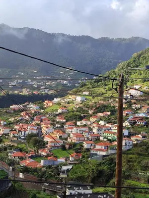 a view of a town in a mountain at Delfina`s House in Machico