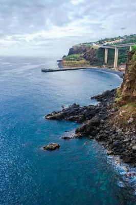 an aerial view of a bridge over a body of water at GuestReady - Cliff residence with sea views in Gaula