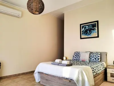 a bedroom with a bed in a room at Varandas Guest Apartment in Aljezur