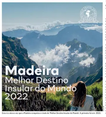 a poster of a woman looking at a mountain at Casa Jardim in Ponta do Pargo