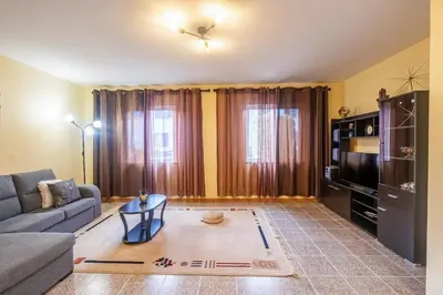 a living room with a couch and a tv at Santana House Holiday Rental - For Nature Lovers by YOUR KEY in Santana