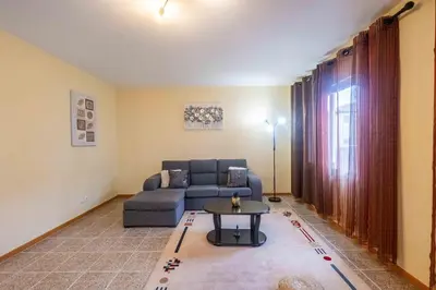 a living room with a couch and a table at Santana House Holiday Rental - For Nature Lovers by YOUR KEY in Santana