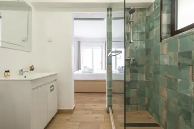 a bathroom with a shower and a sink at A18 - Luz Studio in Praia da Luz in Luz
