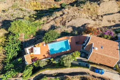 an overhead view of a house with a swimming pool at Villa Tabua in Ribeira Brava