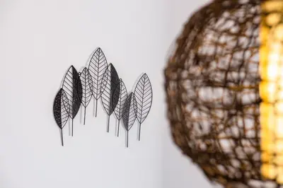 a pair of black feathers next to a net at GuestReady - A splendid sea-view stay in Caniço